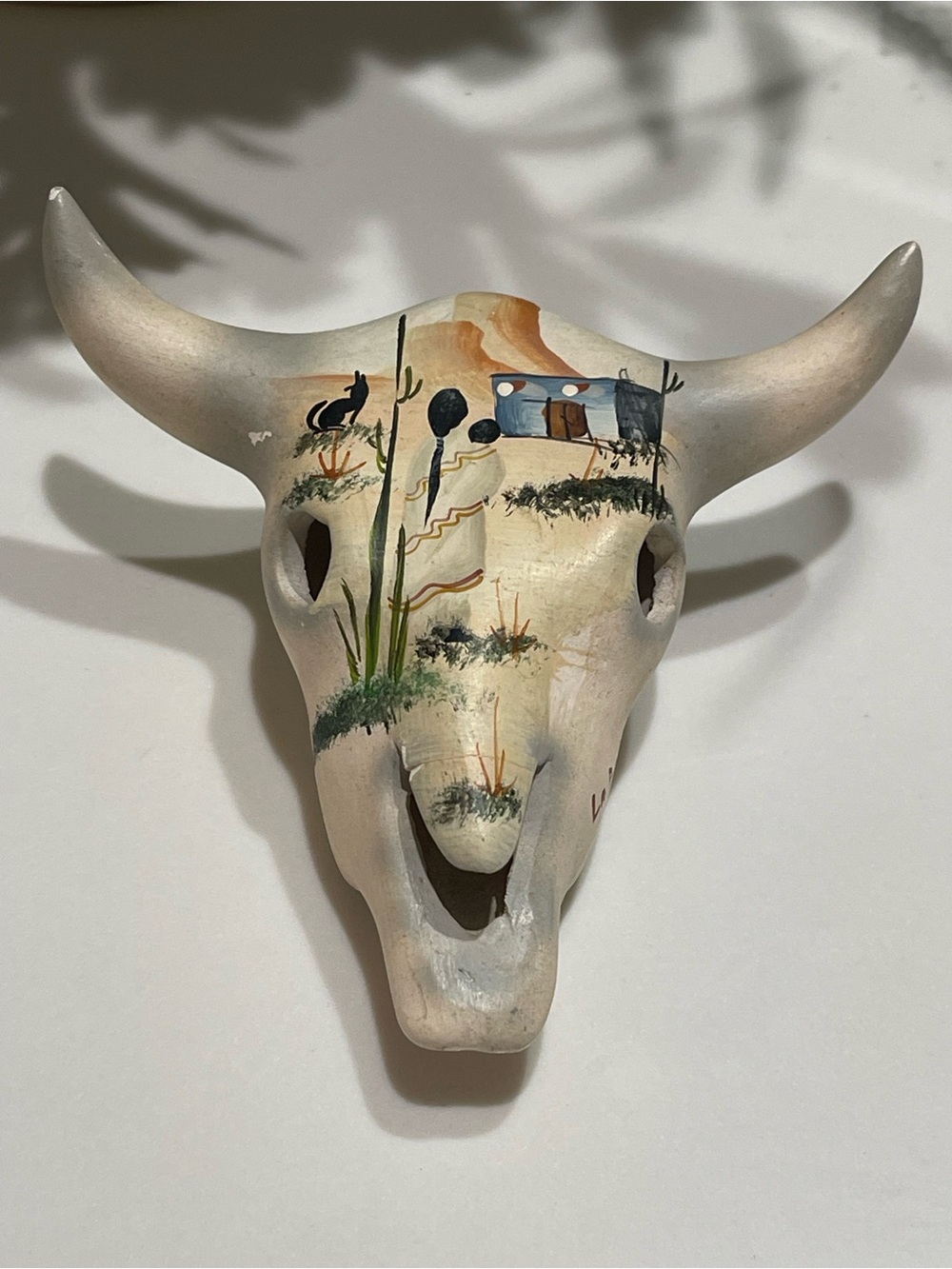 decorative ceramic bull or steer skull featuring Southwestern-style hand-painted